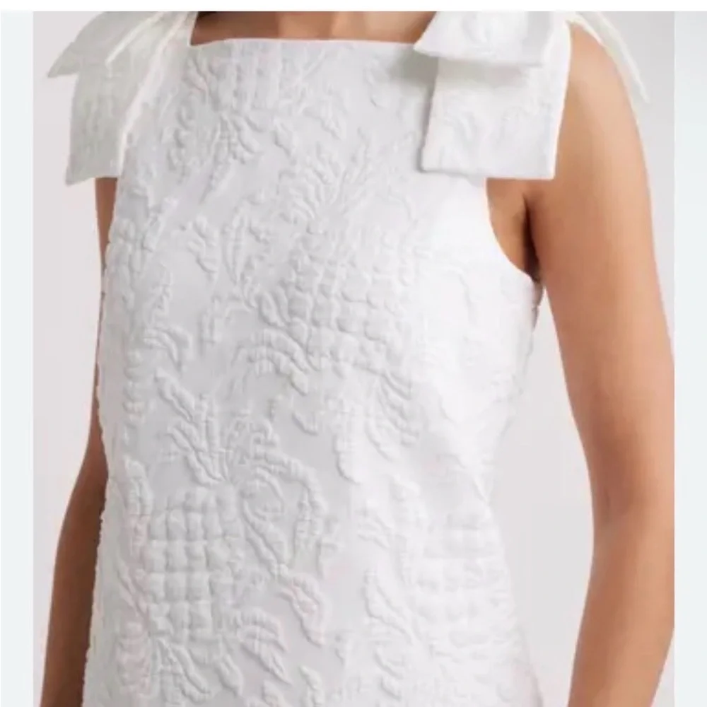 Lilly Pulitzer White Textured Midi Dress with Bow Shoulders - Picture 4 of 13